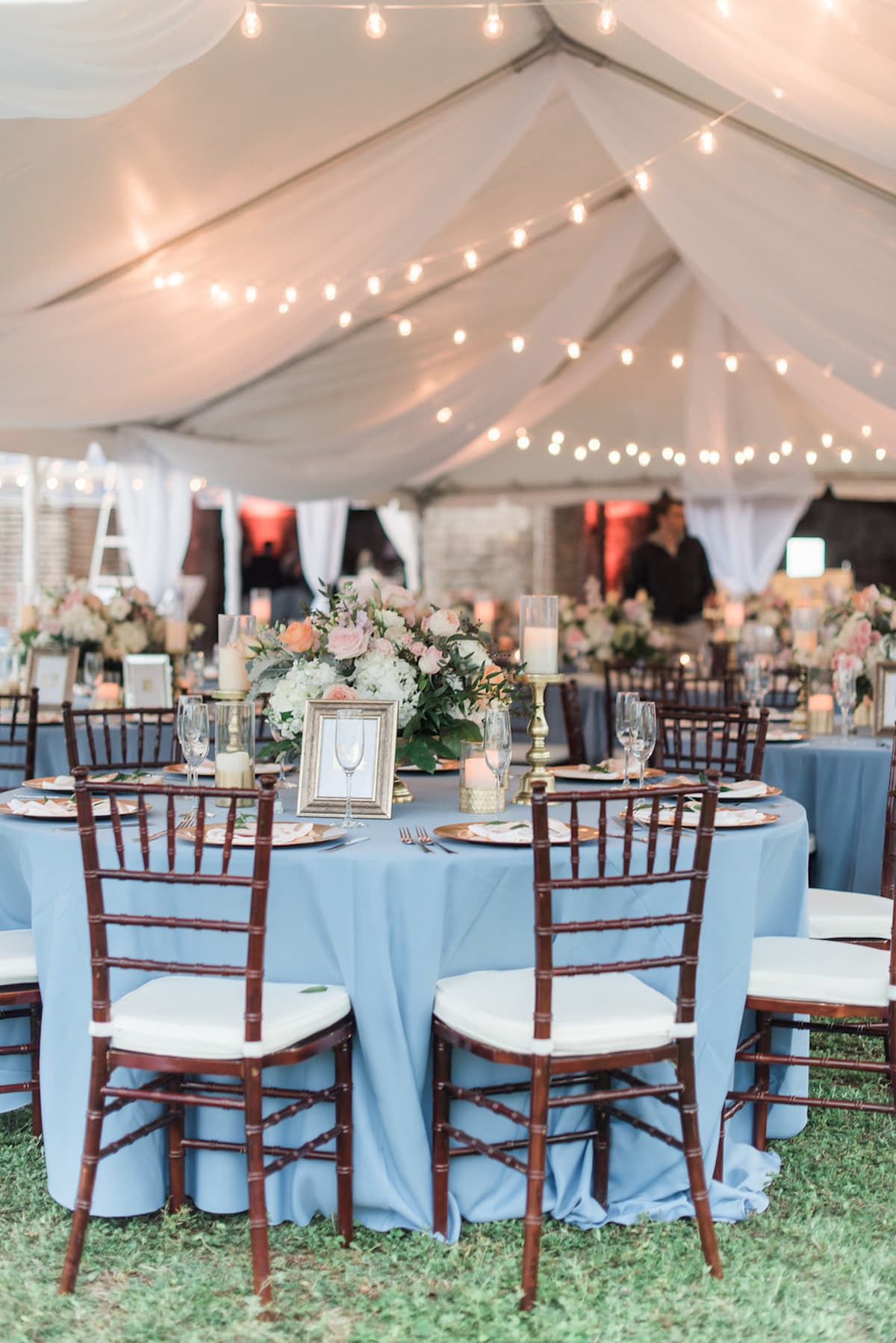 Key West wedding reception with floral centerpieces and candles